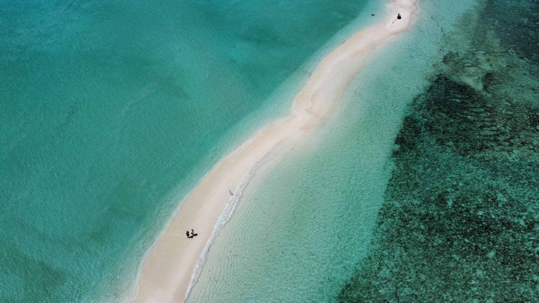 White sandbank surrounded by turquoise ocean in the Maldives